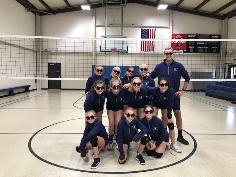 volleyball team with glasses